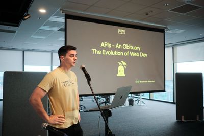 Image of a speaker giving a talk at tim.js meetup